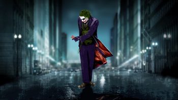 Batman Joker Walking on Road Photos