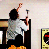Funny Andy Tries To Hammer Hole In Wall Animated Gif