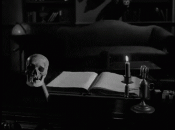 Scarey Black White Book Skull Magic Animated Gif